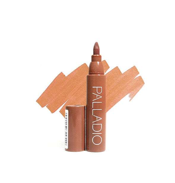 Tan Palladio lip stain pen with cap removed and sample color swatch drawn behind
