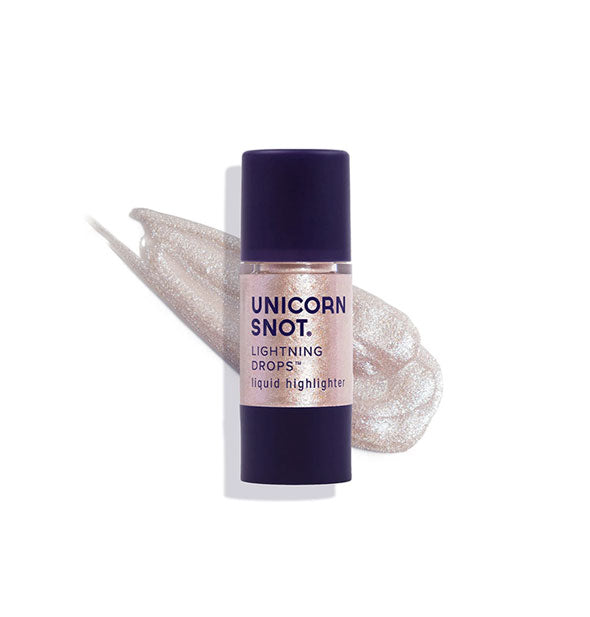 Bottle of Unicorn Snot Lightning Drops Liquid Highlighter in the shade Nymph with sample application