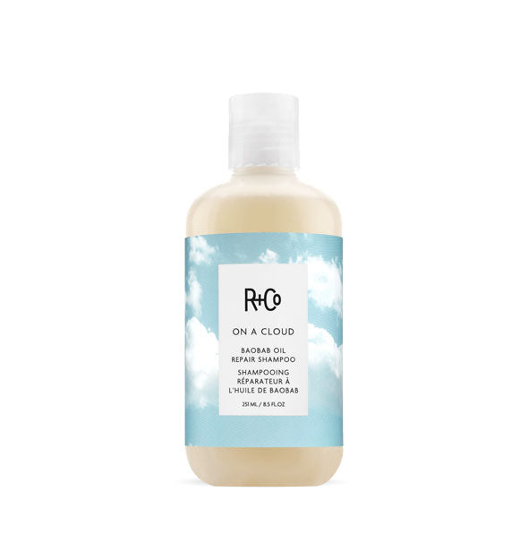 8.5 ounce bottle of R+Co On a Cloud Baobab Oil Repair Shampoo