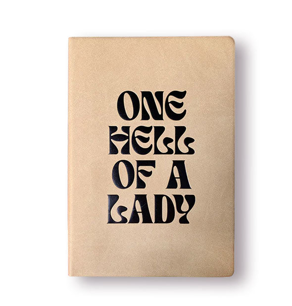 Tan journal cover is stamped with the words, "One Hell of a Lady" in black lettering