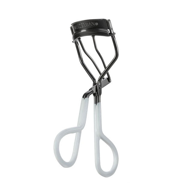 Stainless steel Tweezerman eyelash curler with white handles