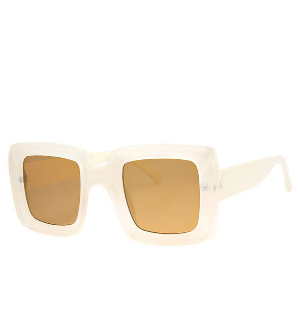 Pair of white square sunglasses with amber lens