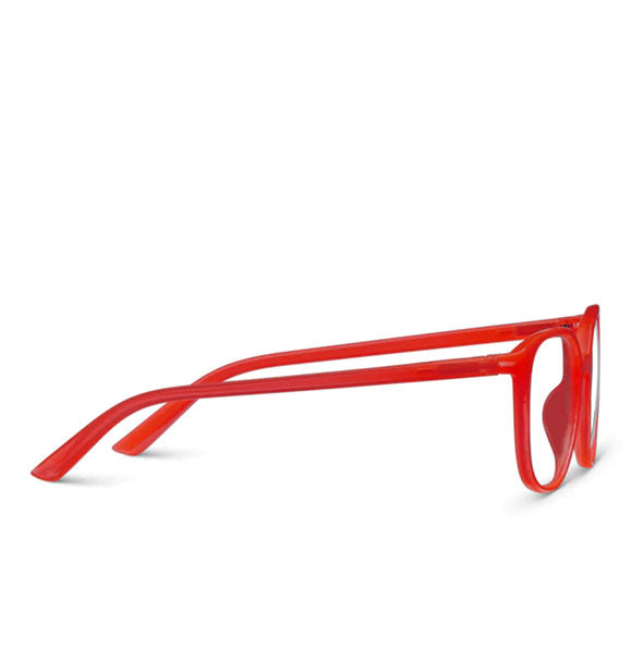 Side view of a pair of bright red-orange glasses frames