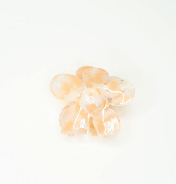 Mottled orange creamsicle colored flower-shaped hair claw clip