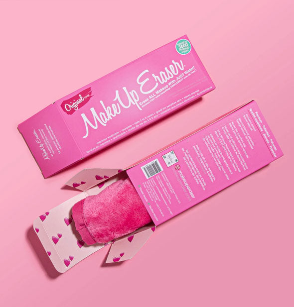 One closed and one opened Original MakeUp Eraser box with pink cloth partially emerging