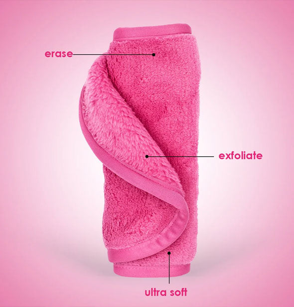 Rolled up pink MakeUp Eraser cloth is labeled, Erase, Exfoliate, Ultra Soft