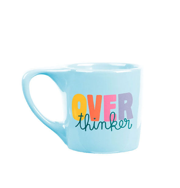 Sky blue mug says, "Overthinker" in both block and script typefaces