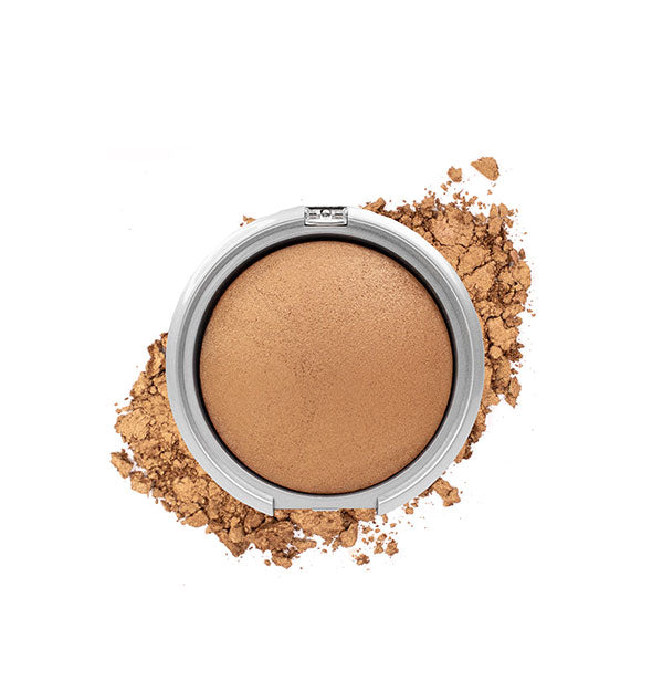 Bronzer compact with crushed product in a golden shade