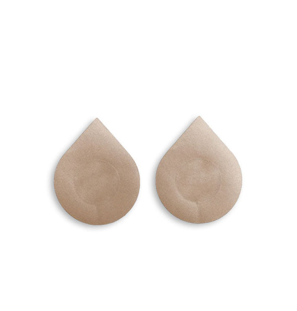 Pair of light-colored teardrop-shaped nipple covers