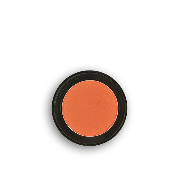 Salmon-colored pressed powder eyeshadow