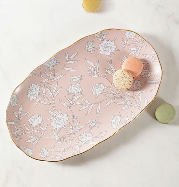 Wide oval pink floral platter with white details and gold rim