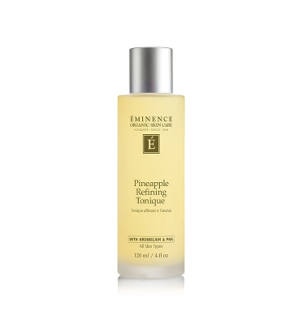 4 ounce bottle of Eminence Organic Skin Care Pineapple Refining Tonique with golden contents and a silver cap