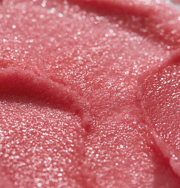 Closeup of pink-colored sugar scrub