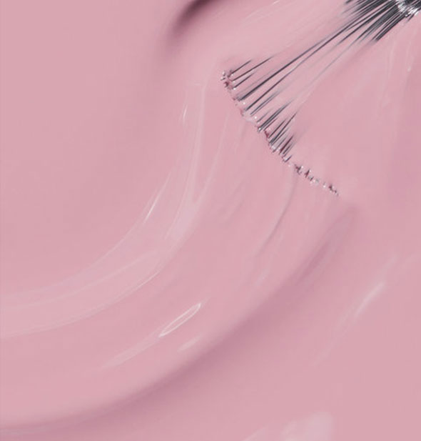 Blush pink nail polish with brush tip