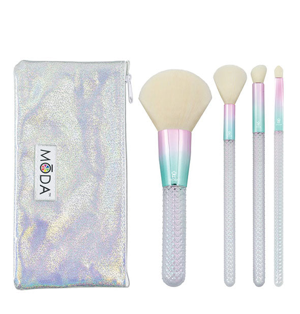Set of four Moda makeup brushes with pink-to-green ombré ferrules and faceted iridescent handles next to a silvery iridescent zippered storage case