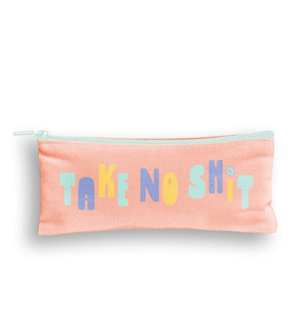 Rectangular pink canvas pouch with light blue top zipper says, "Take No Shit" in light blue, dark blue, and yellow staggered lettering with daisy graphic over the I