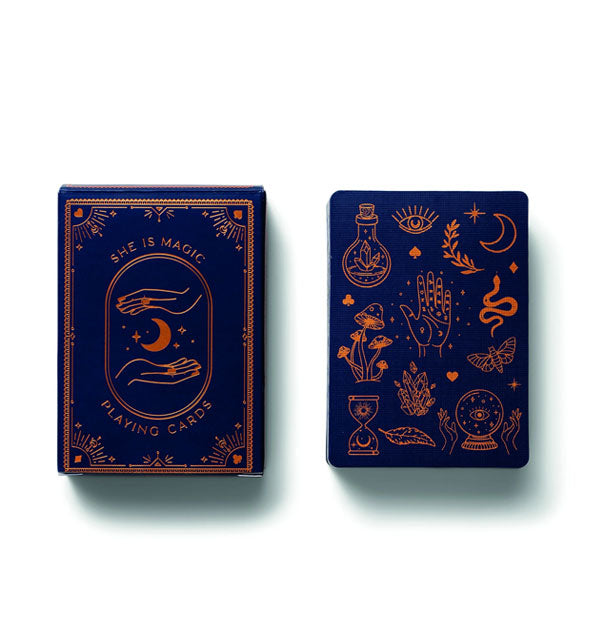 Dark blue "She is Magic" playing card deck with elaborate metallic gold accents