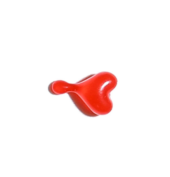 Heart-shaped red capsule with teardrop nub