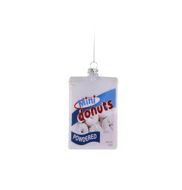 Rectangular hanging glass ornament painted to resemble a box of Powdered Mini Donuts