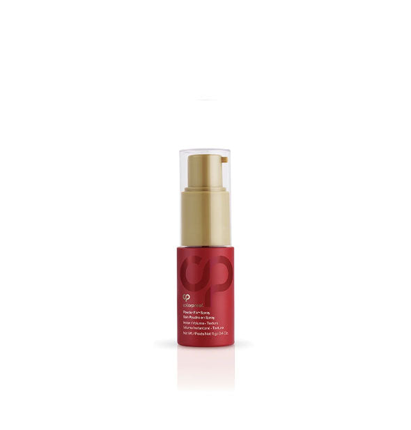 Small red and gold bottle of ColorProof Powder Fix Spray