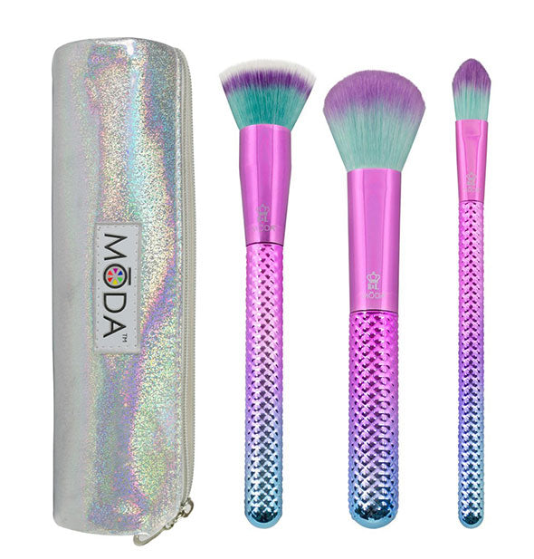 Set of three Moda makeup brushes with blue, purple, and green ombré design, metallic faceted handles, and sparkly iridescent zippered storage pouch