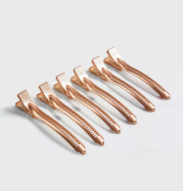 Six rose gold hair clips