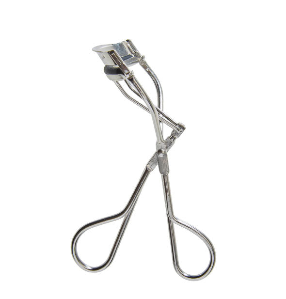 Silver eyelash curler with silicone pad