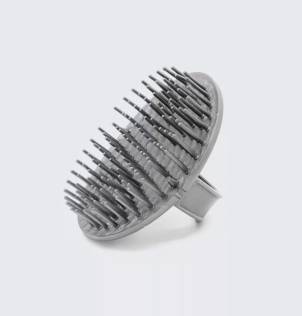 Side view of the Scalp Exfoliator brush shows handle at back