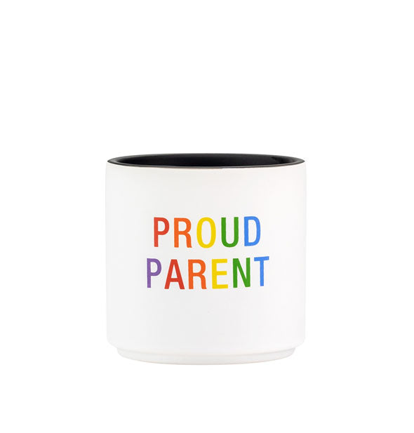 White planter pot with black interior says, "Proud Parent" in rainbow-colored lettering