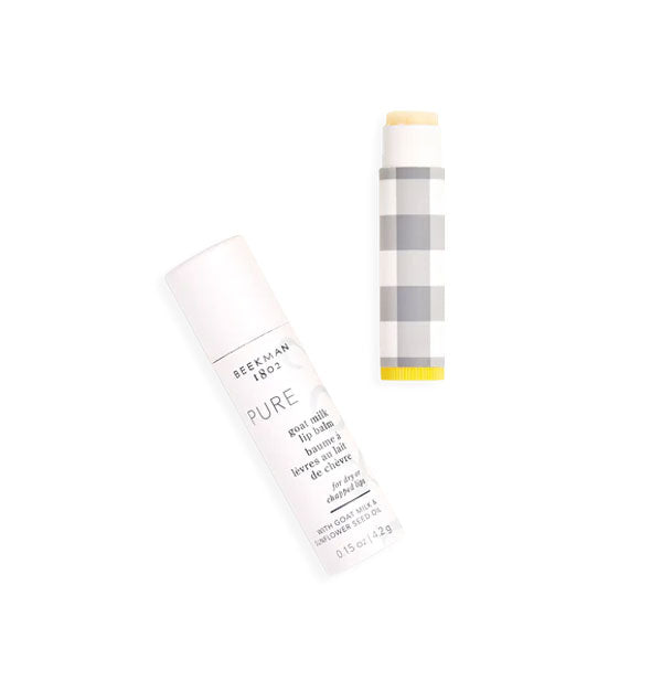 Yellow, grey, and white lip balm tube with Beekman 1802 packaging