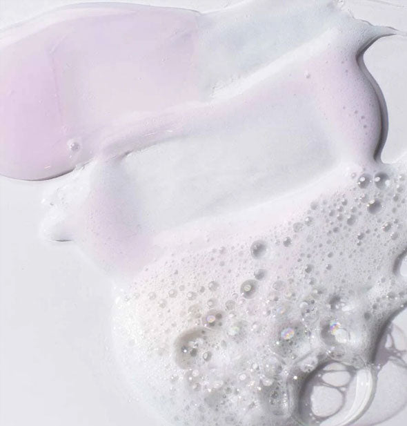 Closeup of Pureology Pure Volume Shampoo shows product color and consistency