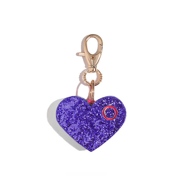 Purple glitter heart-shaped personal alarm with gold lobster clasp attached