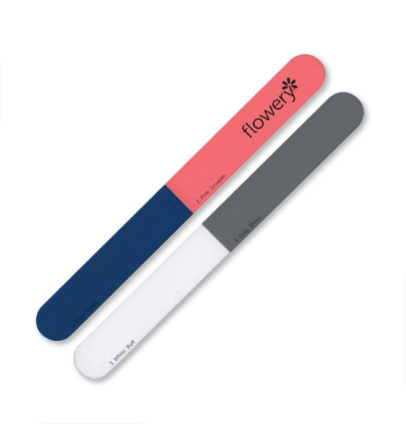 Two two-tone Flowery nail files, one dark blue and coral and the other white and gray