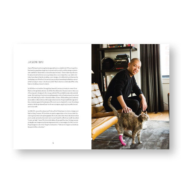 Page spread from Queer Icons and Their Cats features a chapter on Jason Wu alongside a photograph of the artist with his cat wearing a pink cast on its hind leg