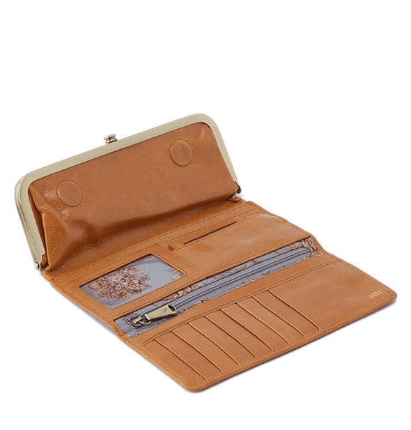 Honey-brown leather wallet shown open to reveal storage slots and compartments inside