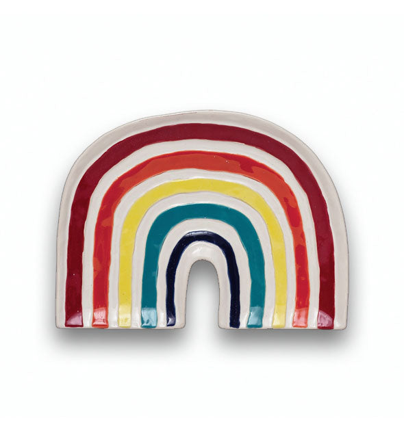Arced white rainbow platter with hand-painted stripes in red, orange, yellow, teal, and dark blue