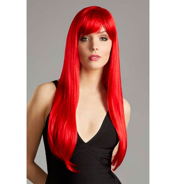 Model wearing a long, bright red wig with bangs.