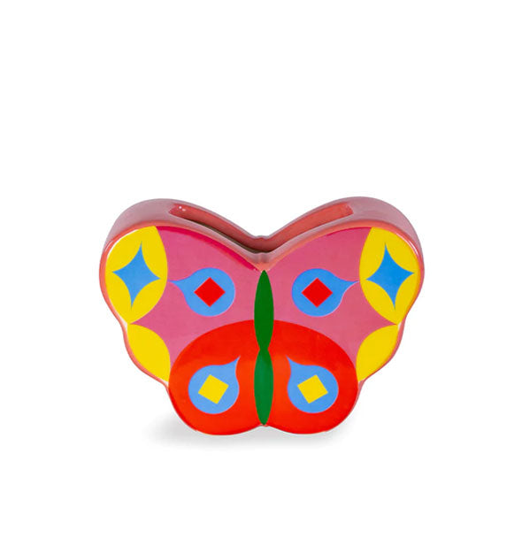 Predominantly pink butterfly-shaped vase with accents of red, green, blue, and yellow