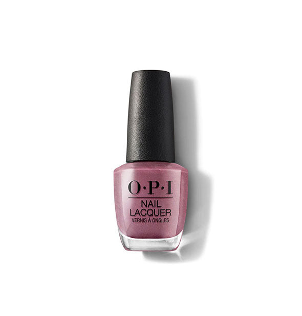 Bottle of OPI Nail Lacquer in a dark, muted mauve shade with some iridescence