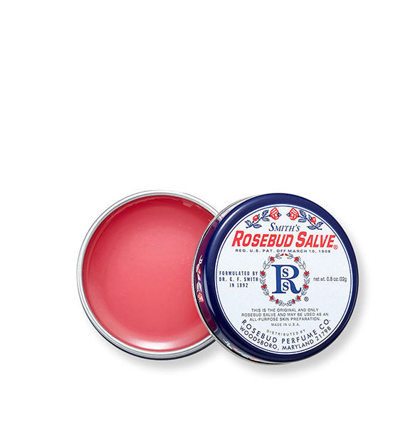 Round Smith's Rosebud Salve tin with lid removed to reveal pink product inside