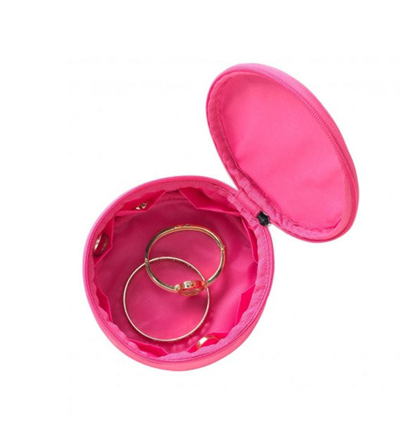 Open pink zippered jewelry storage case