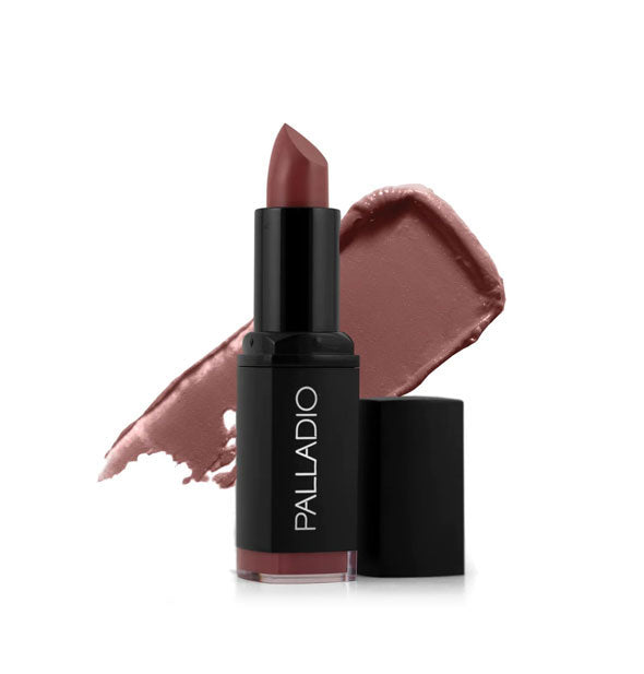 Black tube of Palladio lipstick with cap removed and color swatch behind in a dark pinkish-brown shade called Royal Rum
