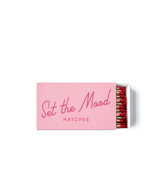Pink rectangular pack of red-tipped matches says, "Set the Mood"