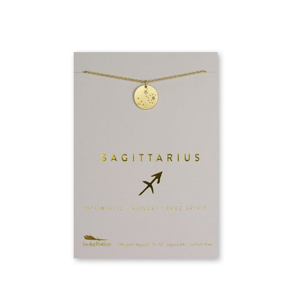 Gold Sagittarius necklace on card with metallic gold print and symbol