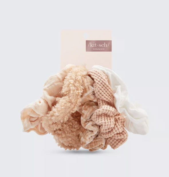 Set of five fabric hair scrunchies by Kitsch in varying textures and light, neutral shades