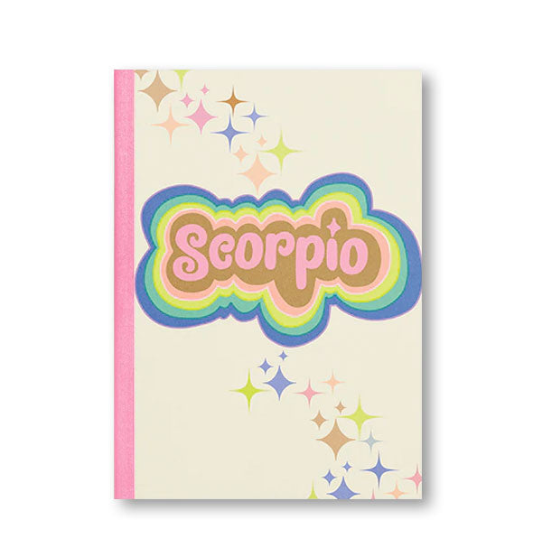 Notebook cover with pink binding, colorful stars, and colorful radiant lettering that reads, "Scorpio"