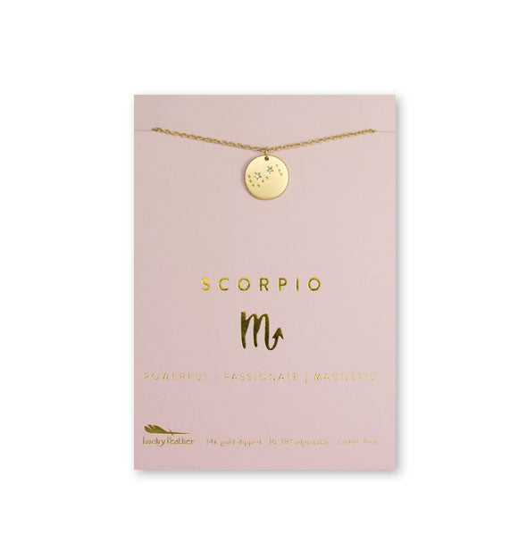Gold Scorpio necklace on card with metallic gold print and symbol