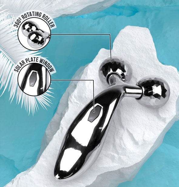 Sculpting Massager on white glacier-like surface is labeled, "360° rotating roller; Solar plate window"