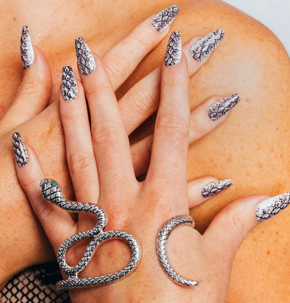 A woman wearing "Serpent" Press On Nailz