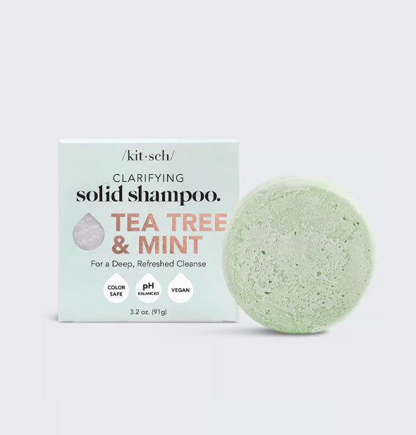 Round green bar of Clarifying Tea Tree & Mint Solid Shampoo by Kitsch with packaging